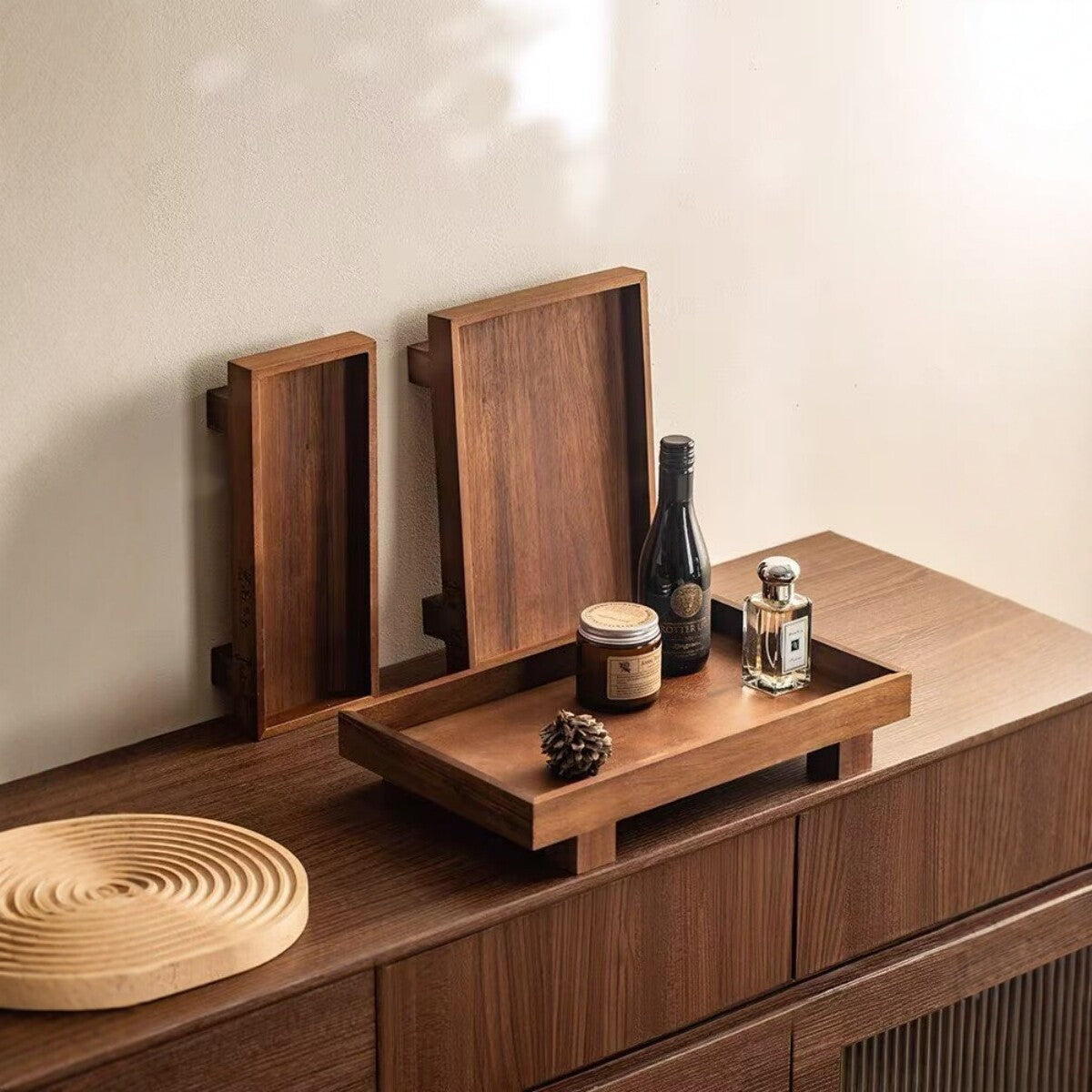 Walnut wood storage tray with small items