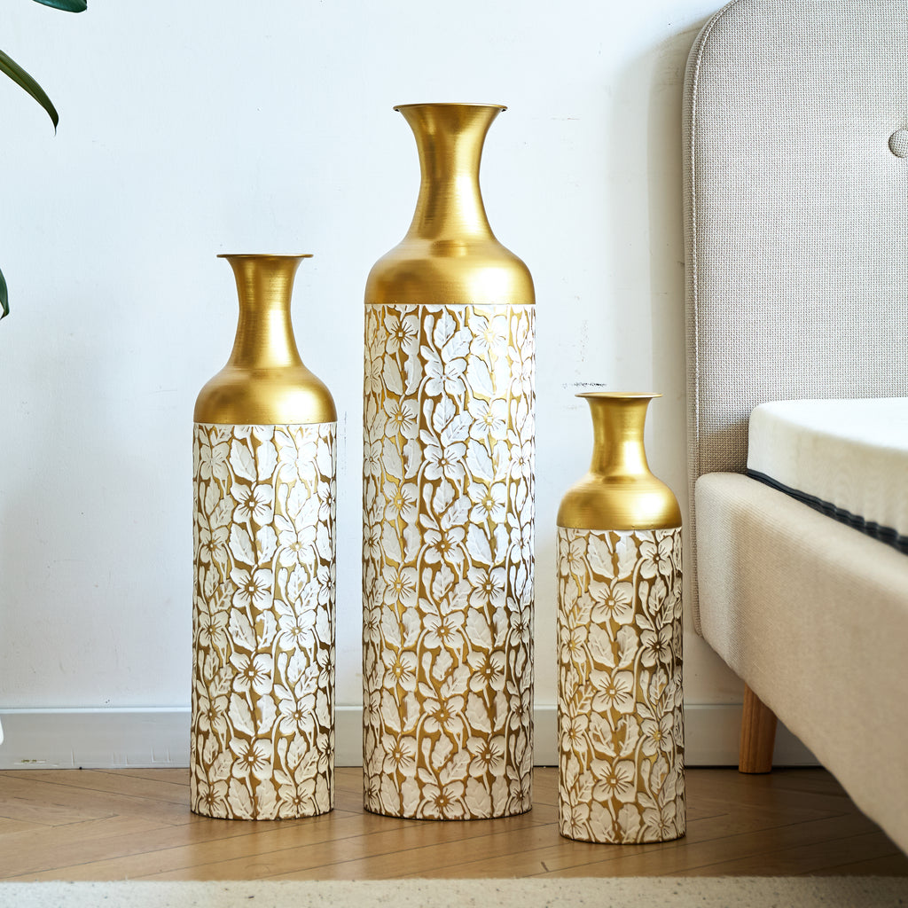 Gold and white floor vases, set of three