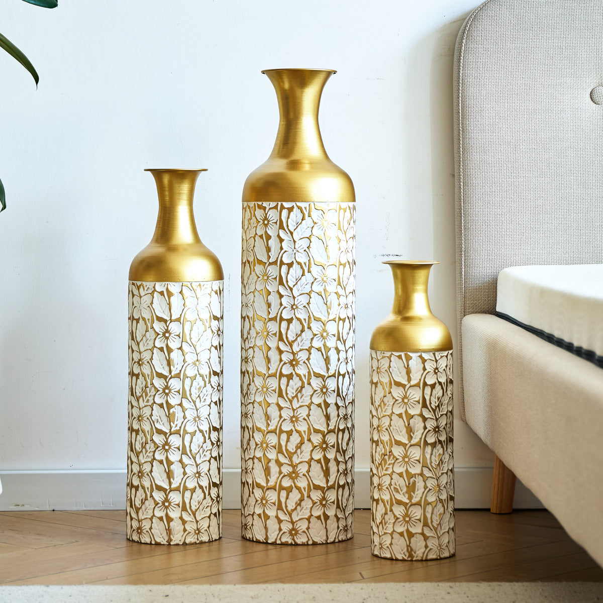Gold and white floor vases, set of three