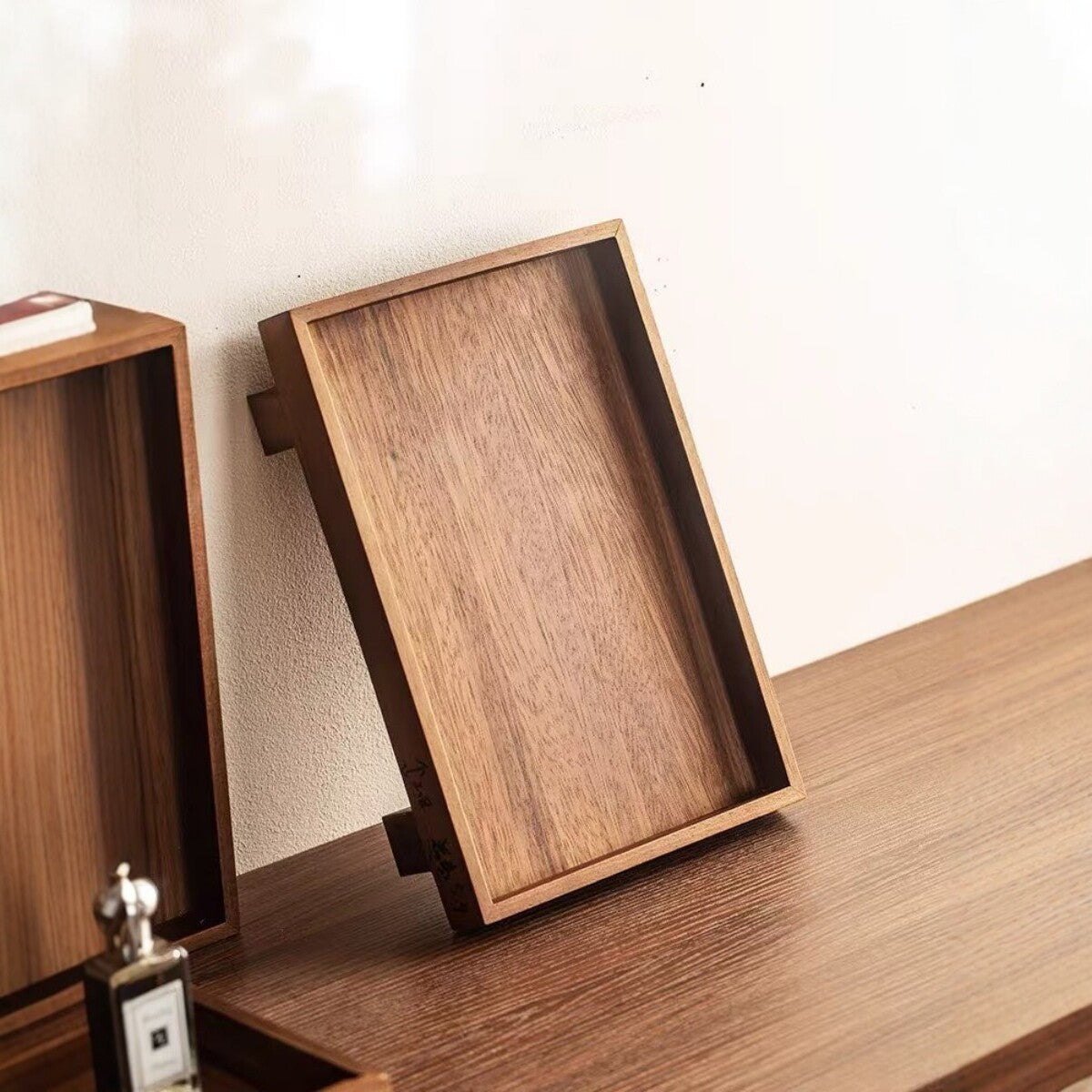 Two walnut wood storage trays