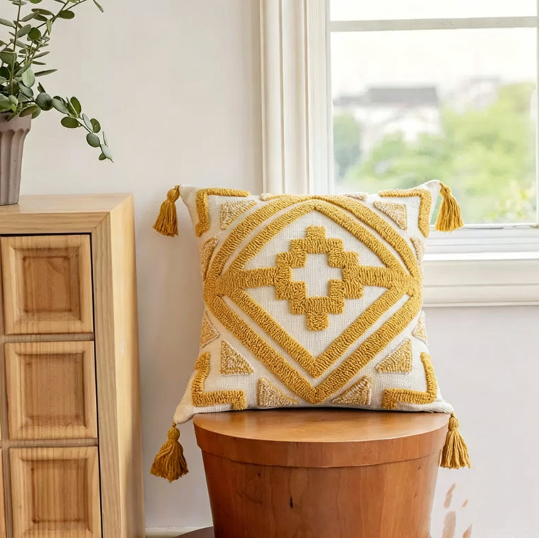 Geometric tufted cushion on a wooden stool
