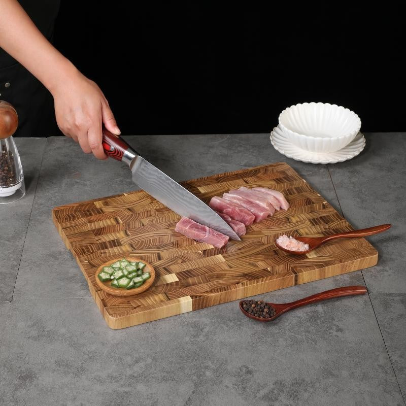 End-grain cutting board with knife